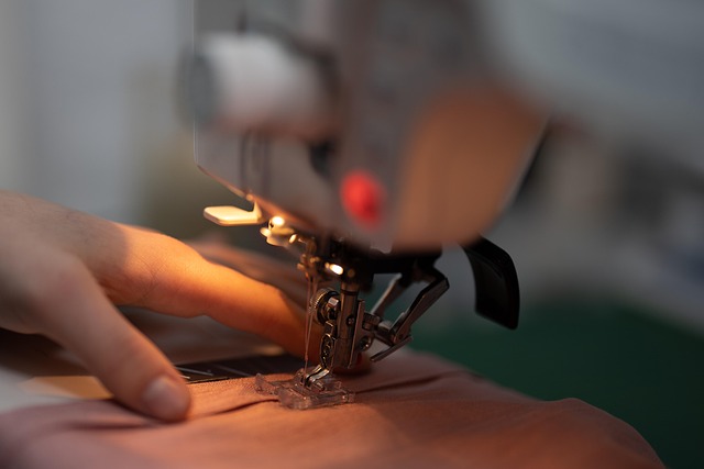 hands sewing compression garment seams