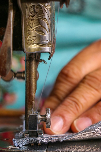 sewing machine stitching sportswear fabric close-up